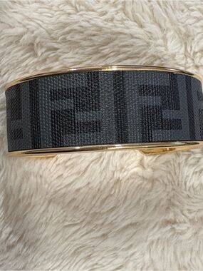 3 Gold toned Designer Inspired Bracelets.